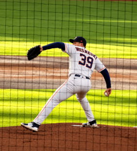 Houston Astros starting pitcher Hayden Wesneski delivers a pitch at Daikin Park.