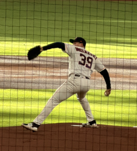 Houston Astros starting pitcher Hayden Wesneski delivers a pitch at Daikin Park.