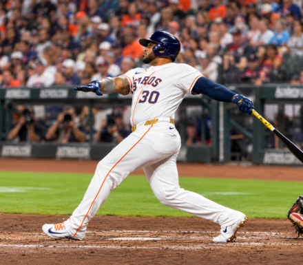 Nelson Velázquez follows through on a swing for the Astros at Daikin Park.