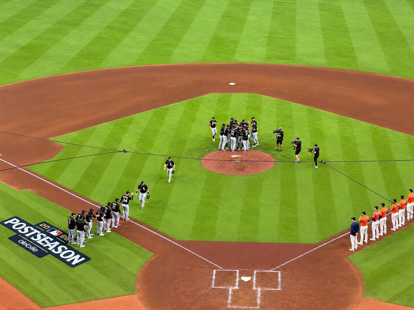 Chicago White Sox players celebrate on the field at Daikin Park after eliminating the Houston Astros from the 2026 postseason.
