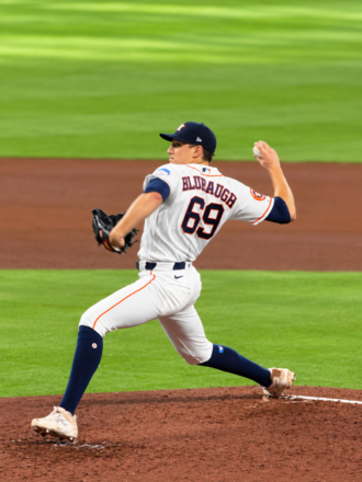 AJ Blubaugh delivers a pitch for the Houston Astros at Daikin Park.