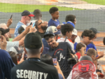Mauricio Dubón smiles and greets fans at Daikin Park during his return to Houston with the Atlanta Braves.
