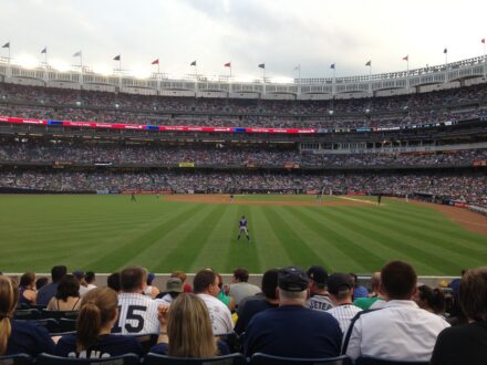 View of the field and stands at Yankee Stadium during a baseball game.
