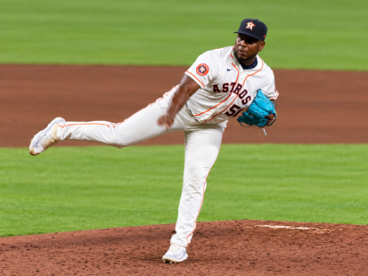 Astros pitcher Ronel Blanco follows through after delivering a pitch from the mound.