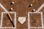 Four baseballs sit outside an illustrated strike zone above home plate, with a bat lying unused in the batter’s box.