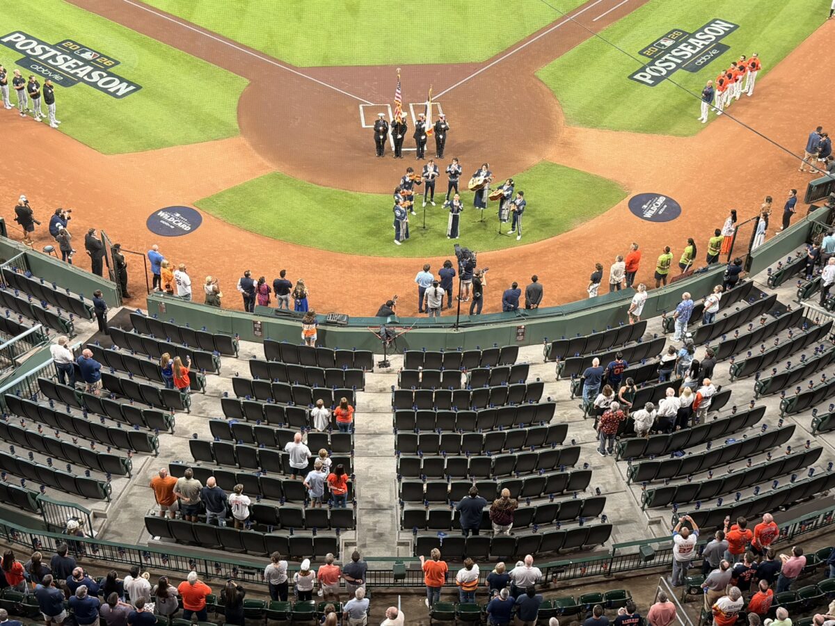 Empty seats behind home plate at Daikin Park during a pregame ceremony for the Houston Astros' 2026 Wild Card Series.